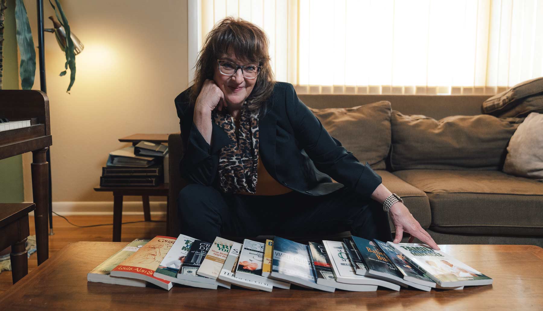 Patricia Ross with her published books